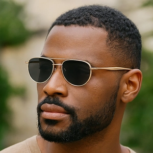 Retro double-bridge oval sunglasses with gold metal frames and dark lenses for men and women