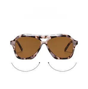 Detail of tortoise shell aviator sunglasses with double bridge and brown lenses