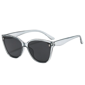 Y2K vintage square frame sunglasses in translucent grey-blue with metal rivet accents