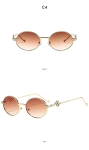 Detail view of gold snake-shaped temples and brown gradient lenses on oval sunglasses
