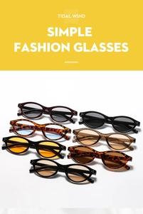 Collection of retro oval sunglasses with metal studs in various frame and lens colors