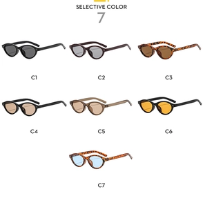 Macro shot of seven retro oval sunglasses in various colors with metallic stud accents