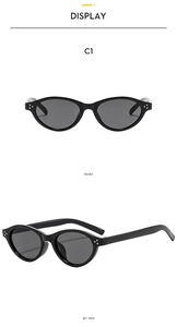 Front and 45-degree side view of vintage black oval sunglasses with silver metal studs