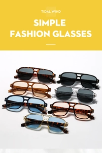 Collection of multi-colored retro pilot sunglasses with double-bridge frames and metal rivets