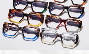 Flat lay of retro square sunglasses in various tortoiseshell and colorful frames