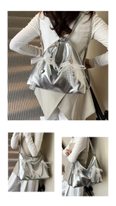 Detail of silver balletcore tote bag with lace bows, faux pearls and heart charms