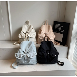 Sacs à dos vintage minimalistes en beige, rose, bleu et noir avec deux poches avant