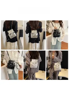 Mini pearl bow backpack detail showing silver, black and white variants in use