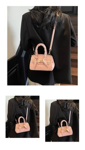Pink lychee grain handbag with printed silk scarf handle and elegant gold metal lock