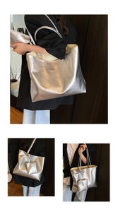 Detail of silver metallic tote bag with wrinkled texture and mini zipper pouch