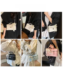 Detail view of quilted cross-body bag with chain strap and lace bow in four colors