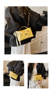 Detailed views of yellow quilted crossbody bag with lace bow and gold chain strap