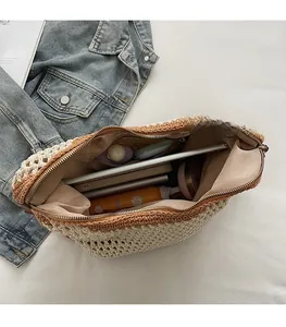 Detail view of woven tote interior with zipper, spacious lining, and daily essentials