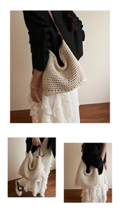 Detail of a minimalist cream woven tote bag with brown straps in a relaxed lifestyle setting