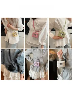 Detailed views of mini leather box handbags in various colors with bead handles