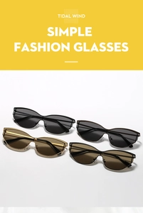 Detail view of Y2K cat-eye sunglasses with metal bar bridge in black and gold frames