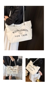 Détail du sac cabas en toile avec imprimé lettres et poignées en corde tissée