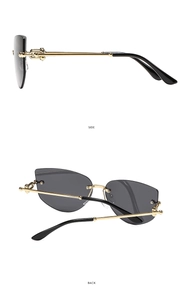 Détails des branches en métal doré avec ornements sphériques sur lunettes sans monture