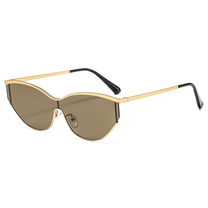 Fashionable Y2K gold metal cat eye sunglasses with brown lenses for stylish women