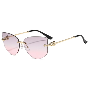Lunettes de soleil polygonales sans monture avec verres dégradés roses et branches dorées