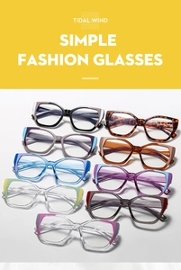 Macro shot of stylish two-tone eyeglass frames showing vibrant colors and cat-eye shape