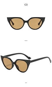 Front and side macro view of black cat-eye sunglasses with glitter accents and amber lenses