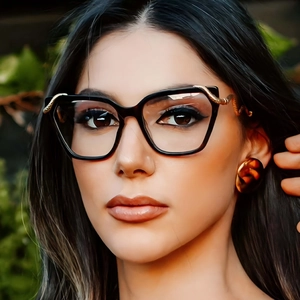 Fashionable square cat-eye sunglasses featuring unique golden snake-shaped metal temples
