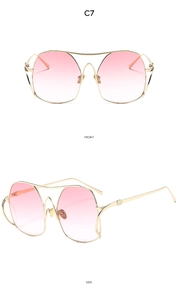 Front and side views of large frame metal sunglasses with gold finish and gradient pink lenses