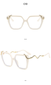 Detail view of square cream frames with gold snake-shaped metal temples on the side