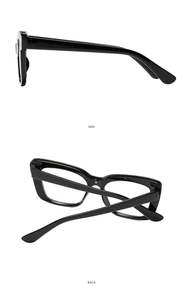 Detail view showing the side and back of black glossy wide-frame fashion glasses