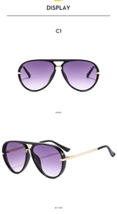 Classic pilot sunglasses with black frame, gold double bridge and purple gradient lenses