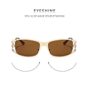 Detailed macro view of gold hollow-out temple hinges with rhinestones on Y2K sunglasses