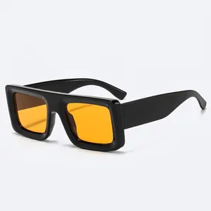 Fashionable square chunky sunglasses with black frame and vibrant yellow lenses