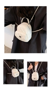 Detailed views of a white quilted mini backpack with chain straps and silver twist lock