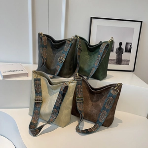 Vintage suede tote bags with bohemian woven straps in grey, green, beige, and brown