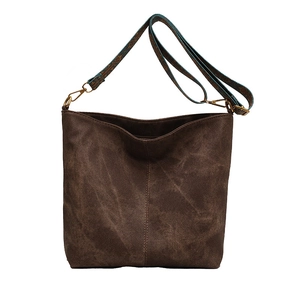 Retro brown canvas crossbody bag with bohemian patterned wide strap and bronze hardware