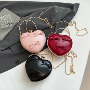 Elegant heart-shaped evening clutch with 3D bows and gold chain strap in multiple colors