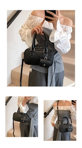 Detail of black woven texture Boston bag showing handheld, shoulder and crossbody styles