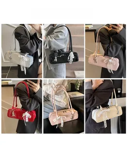 Sacs baguette chics avec nœuds en dentelle et breloques en cinq couleurs différentes