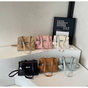 Litchi pattern kelly bag display in six colors with heart charms and metal locks