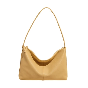 Minimalist bright yellow PU leather half-moon shoulder bag with pebble texture and zipper