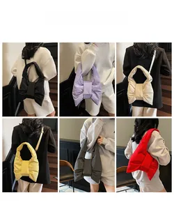 Detailed grid view of plush quilted bow bags in multiple colors shown on a model