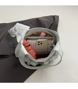 Spacious light gray tote bag interior showing storage for umbrella and essentials