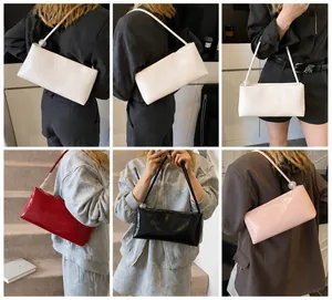 Detail view of stylish underarm bags showing multiple colors and the transparent ball detail