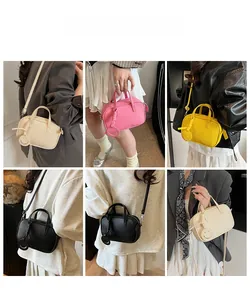 Collage of model carrying a minimalist crossbody bag with smiley charm in four colors