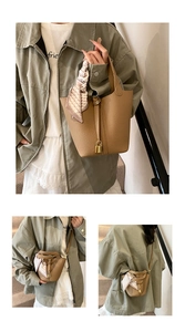 Khaki Beuteltasche mit Litschi-Muster, Seidenschal-Griff und goldenem Schloss