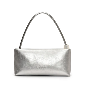 Silver crinkled metallic handbag with arched handle and clear sphere charm in Y2K style