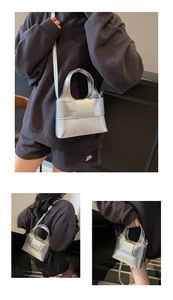 Vue triple du sac seau argenté avec grand nœud et bandoulière longue réglable