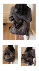 Detail view of large dark brown retro PU leather tote bag with multiple zip pockets