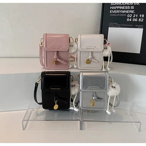 Mini crossbody phone bags in four colors with eye ball charm and metal detail